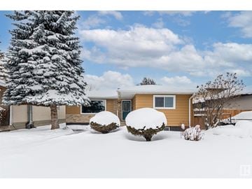 Edmonton house for rent - a home is covered in snow