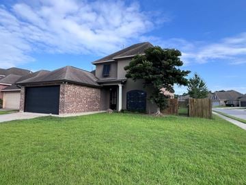 Youngsville house for rent - a house with a yard in front of it