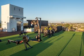 Los Angeles apartment for rent - A gym with a view of the city skyline.