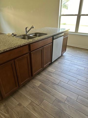 Rome house for rent - a kitchen with a counter and a sink and a window