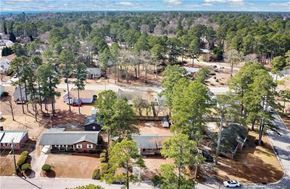 Fayetteville house for rent - an aerial view of a neighborhood with houses and trees