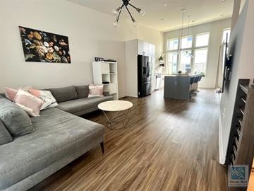 Atlanta house for rent - a living room with a couch and a table