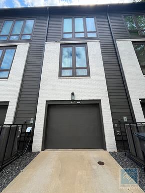 Atlanta house for rent - the front of a building with a garage door
