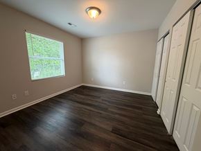 Rock Hill apartment for rent - A room with a window and wooden flooring.
