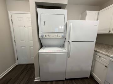 Rock Hill apartment for rent - A white dishwasher and refrigerator in a kitchen.