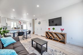 Glendale apartment for rent - a living room with a couch and a table and a tv