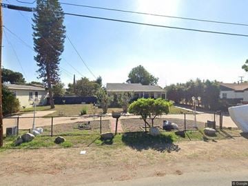 Lemon Grove house for rent - a yard with chickens in a fenced in area