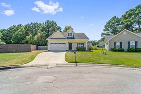 Jacksonville house for rent - A house with a driveway in front of it.