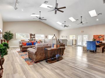 Las Vegas apartment for rent - a large living room with couches and a table