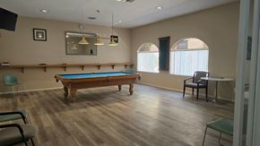 Las Vegas apartment for rent - a large dining room with tables and chairs