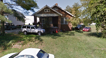 Greenwood house for rent - A house with a white car parked in front.