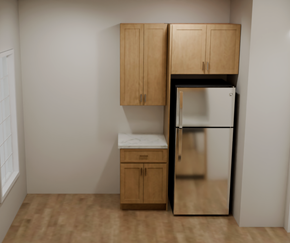 Bayonne apartment for rent - A kitchen with wooden cabinets and a white fridge.