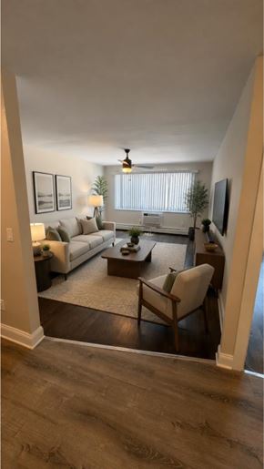 Bayonne apartment for rent - A living room with a couch, chair, and a coffee table.