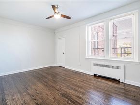 Hasbrouck Heights apartment for rent - A room with a ceiling fan and a window with blinds.