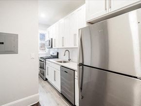 Somerville apartment for rent - A modern kitchen with a stainless steel refrigerator.