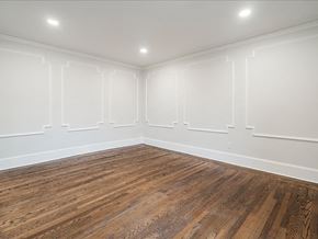 Somerville apartment for rent - A room with wooden flooring and white walls.