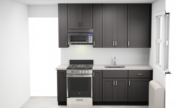 Bergenfield apartment for rent - A modern kitchen with black cabinets and stainless steel appliances.
