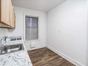 Bayonne apartment for rent - A kitchen with a sink and a window.