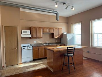 Grinnell apartment for rent - a kitchen with a counter top and a sink