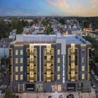 Paterson apartment for rent - an aerial view of a building with a city in the background