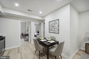 Washington apartment for rent - a dining room with a table and chairs