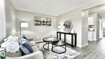 Colorado Springs apartment for rent - a living room with a couch and a coffee table