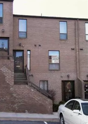 Washington apartment for rent - a white car parked in front of a brick building