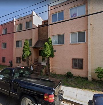 Washington apartment for rent - a black truck parked in front of an apartment building
