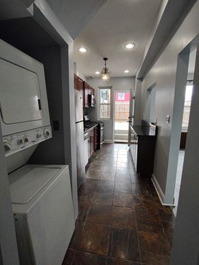 Washington apartment for rent - a kitchen with a washer and a dryer in it