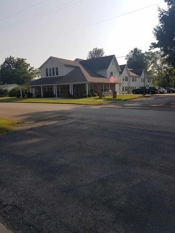 Marienville apartment for rent - a house with a flag on the corner of a street