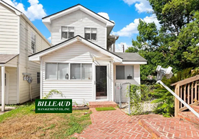 Lafayette apartment for rent - A house with a sign that says Billeaud Management Co. in front of it.