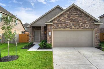 Houston apartment for rent - a garage door in front of a house