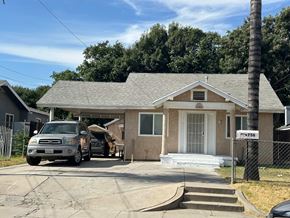 San Bernardino apartment for rent - a house with a van parked outside of it