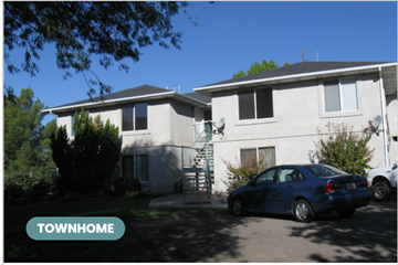 St George house for rent - a white house with a blue car parked in front of it
