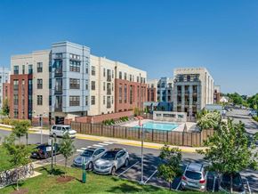 Dulles apartment for rent - an aerial view of an apartment complex with a swimming pool