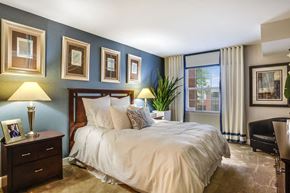 Greenbelt apartment for rent - a bedroom with a bed and a window