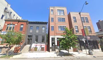 Chicago apartment for rent - a group of buildings on a city street