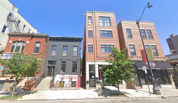 Chicago apartment for rent - a group of buildings on a city street