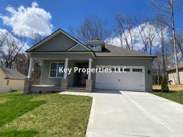 Loudon house for rent - A house with the words Key Properties LLC on the side.
