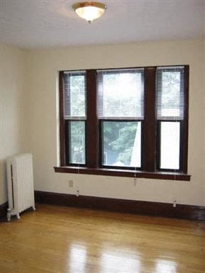 Worcester apartment for rent - a living room with a large window and a wood floor
