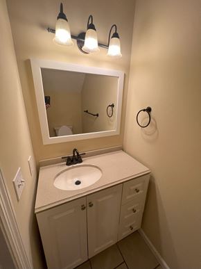 Cleveland apartment for rent - a bathroom with a sink and a mirror