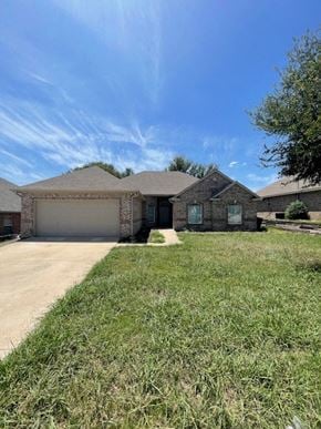 Temple house for rent - a brick house with a garage and a lawn