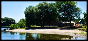 Cobden apartment for rent - a campsite on the shore of a lake near a tree