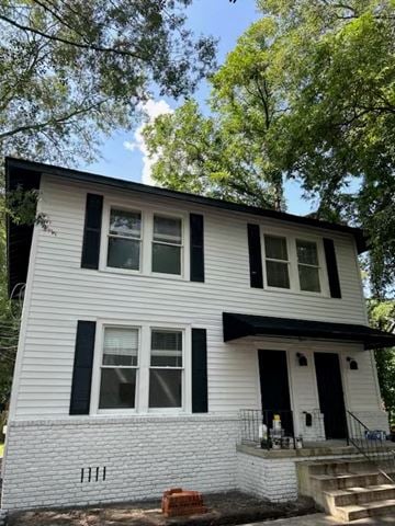 Columbia apartment for rent - a white house with black shuttered windows