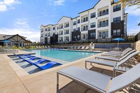 Austin apartment for rent - our apartments have a large pool and lounge chairs