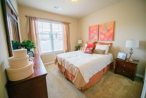 Indianapolis apartment for rent - Bedroom, queen size bed, carpet, large window with blinds