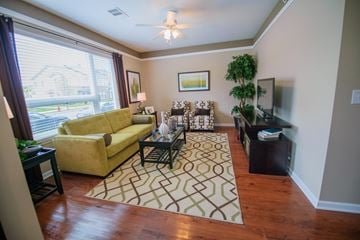 Indianapolis apartment for rent - a living room with a couch and a table and a large window