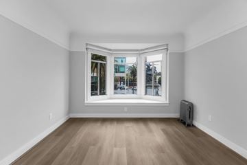 San Francisco apartment for rent - A room with a window and a heater.