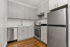 San Francisco apartment for rent - A modern kitchen with a refrigerator on the right.