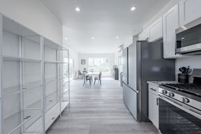 Los Angeles apartment for rent - a kitchen with stainless steel appliances and white cabinets